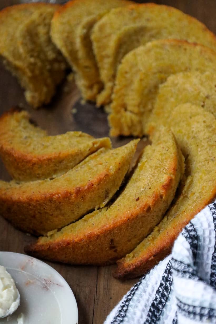 plantain bread sliced on wooden board