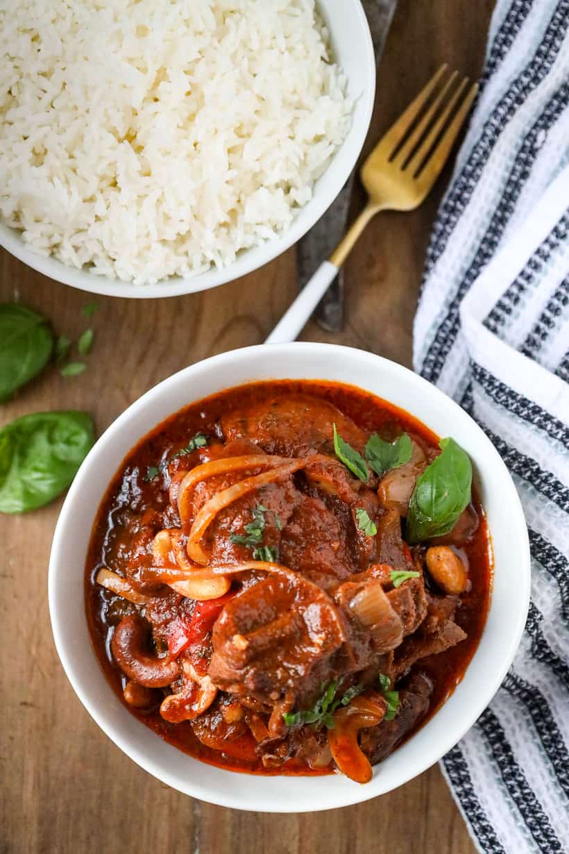 Haitian chicken cashews in white bowl