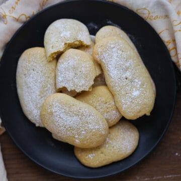 Savoiardi Lady Fingers on black plate