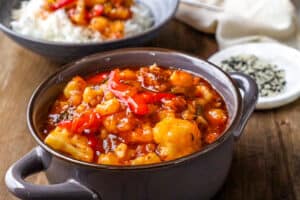 Sweet and sour cauliflower in brown bowl