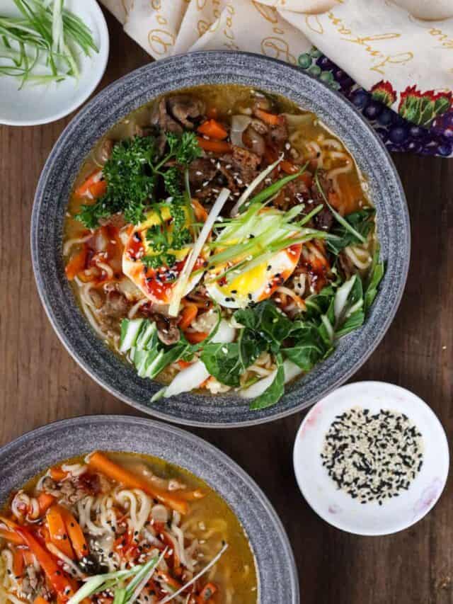 two bowls of beef ramen noodle soup