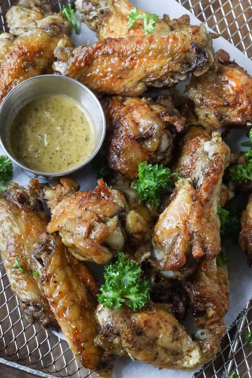 wings with sauce and herbs