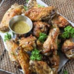 wings with sauce and herbs