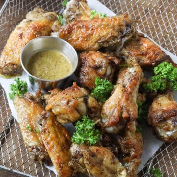 wings with sauce and herbs