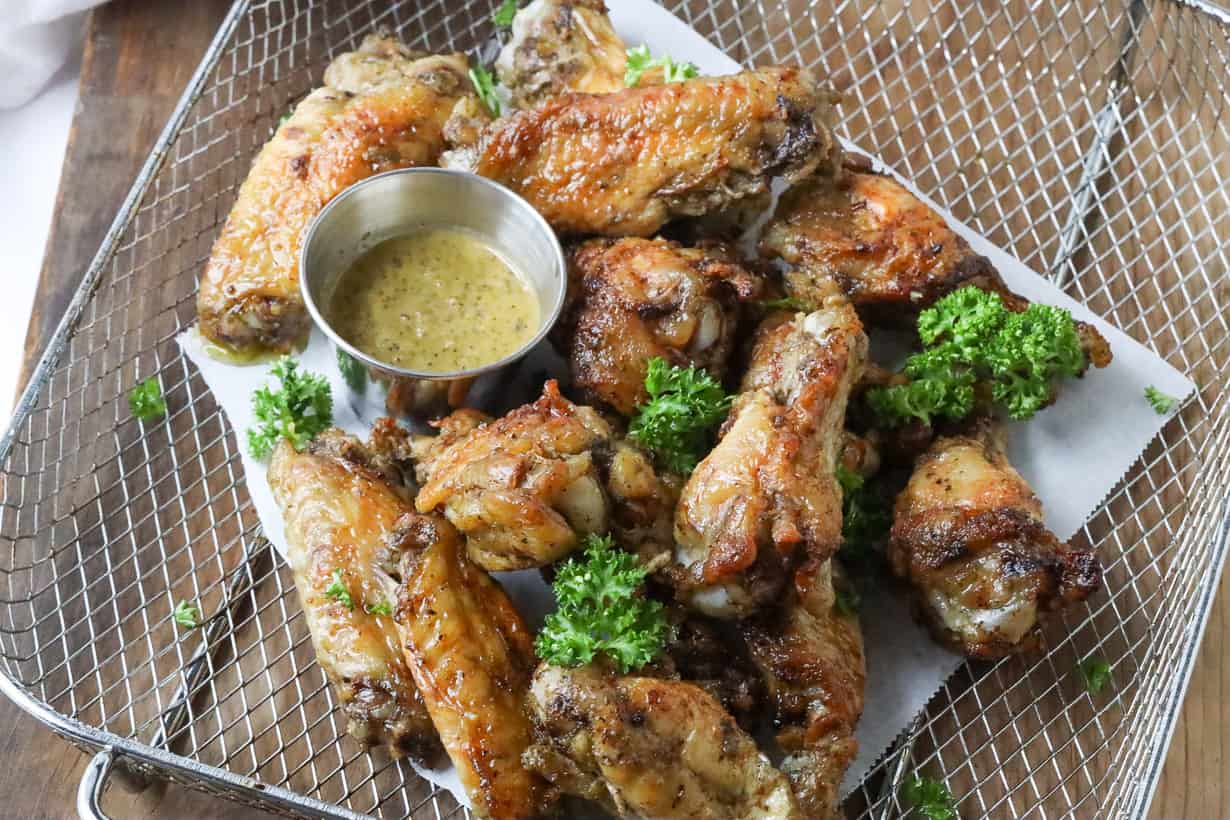 wings with sauce and herbs