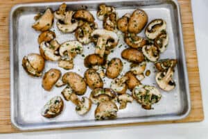 seasoned mushrooms in air fryer tray