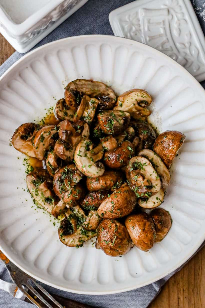 garlic herbs air fryer mushrooms in white bowl