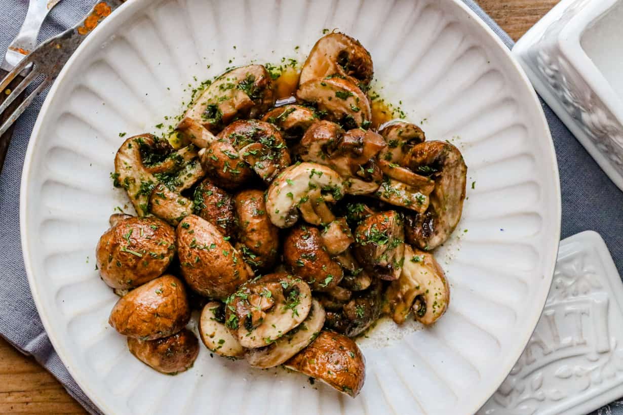 garlic mushrooms in white bowl