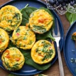 egg muffins with fork on blue plate