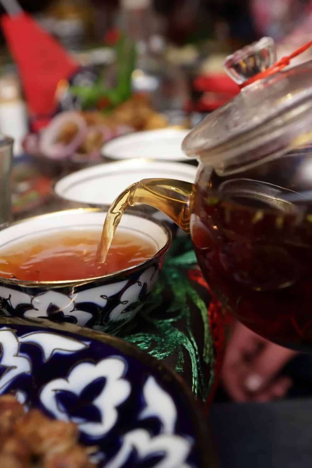 tea pouring in a tea cup