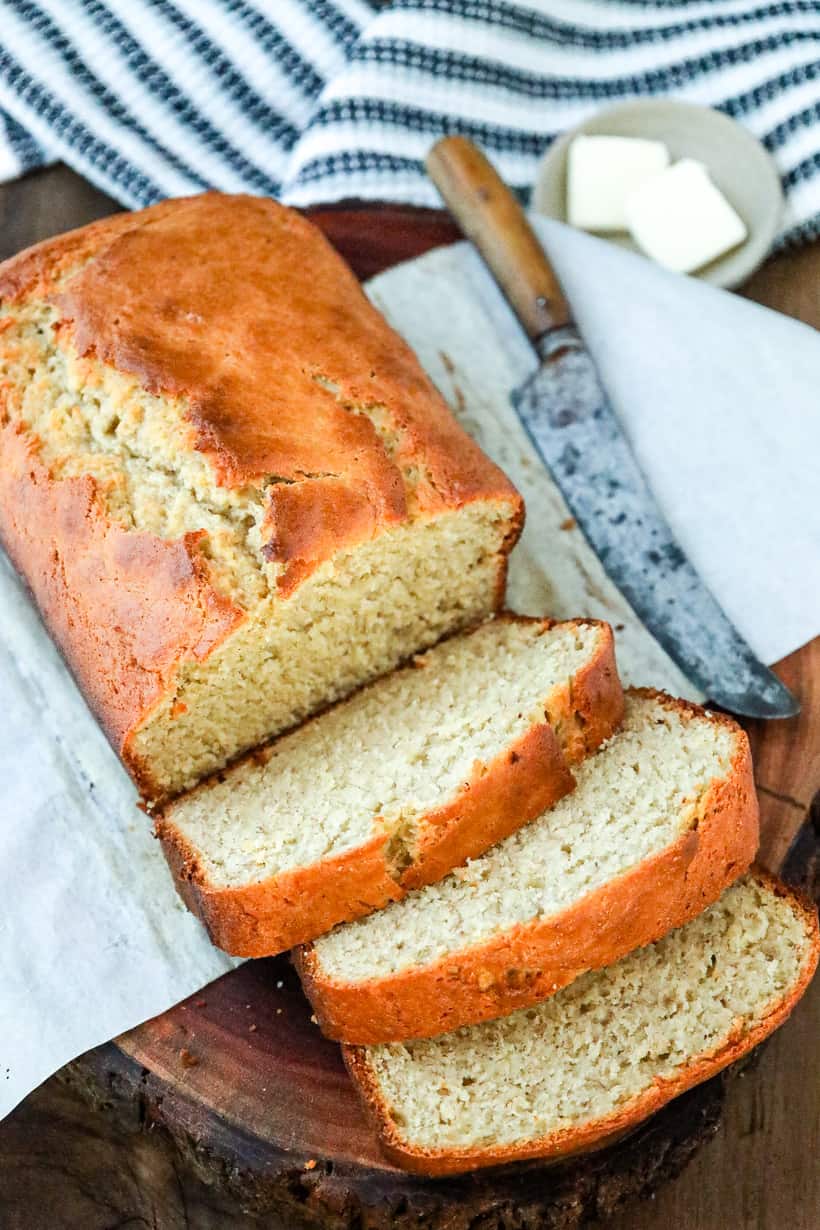 banana bread slices with knife and butter