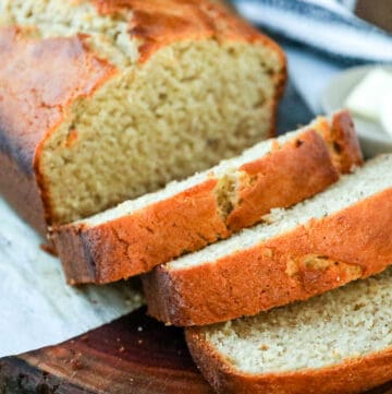 banana bread slices on wooden board