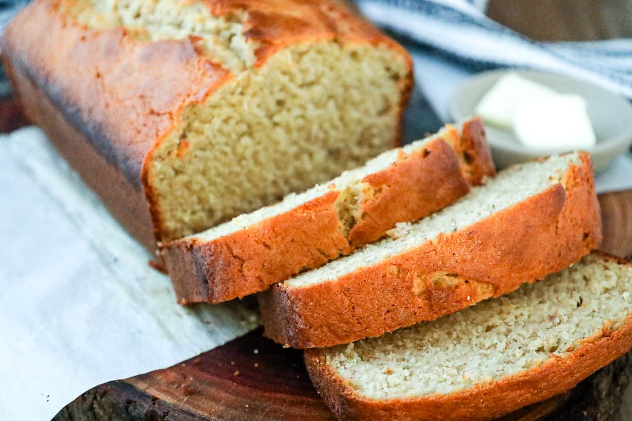 banana bread slices on wooden board