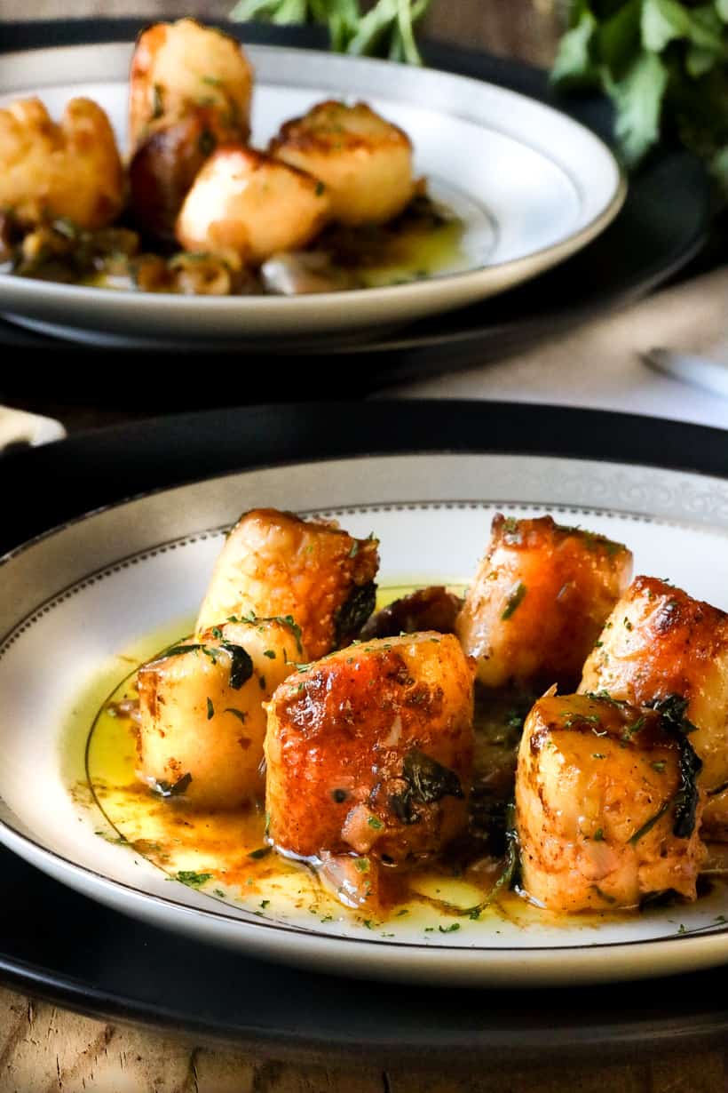 scallop on white plate