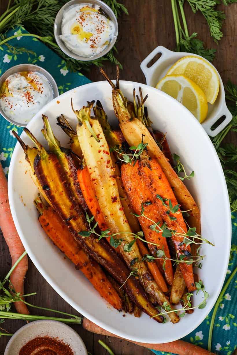 carrots with herbs in white bowl