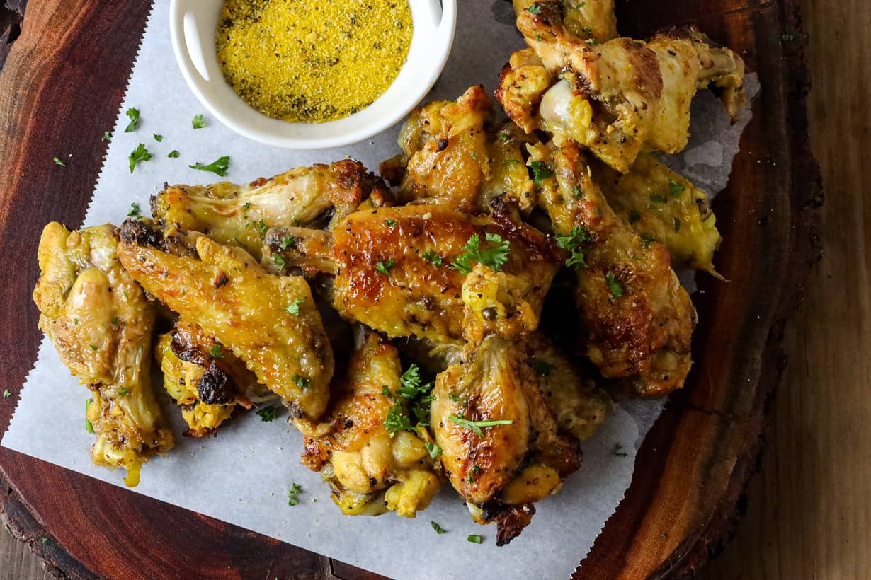 wings on board with lemon pepper and parsley flakes
