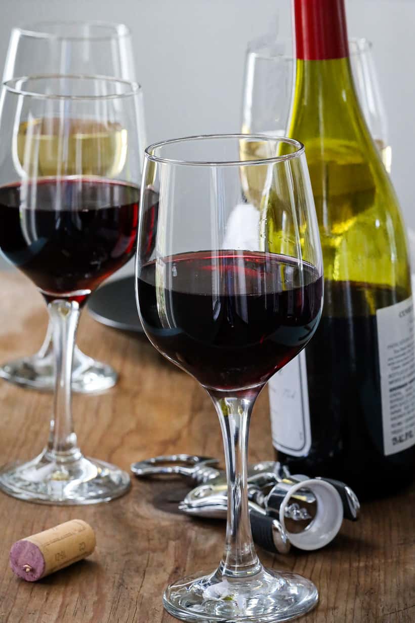 red wine glasses with bottle of wine