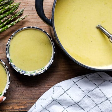 hand holding soup bowl