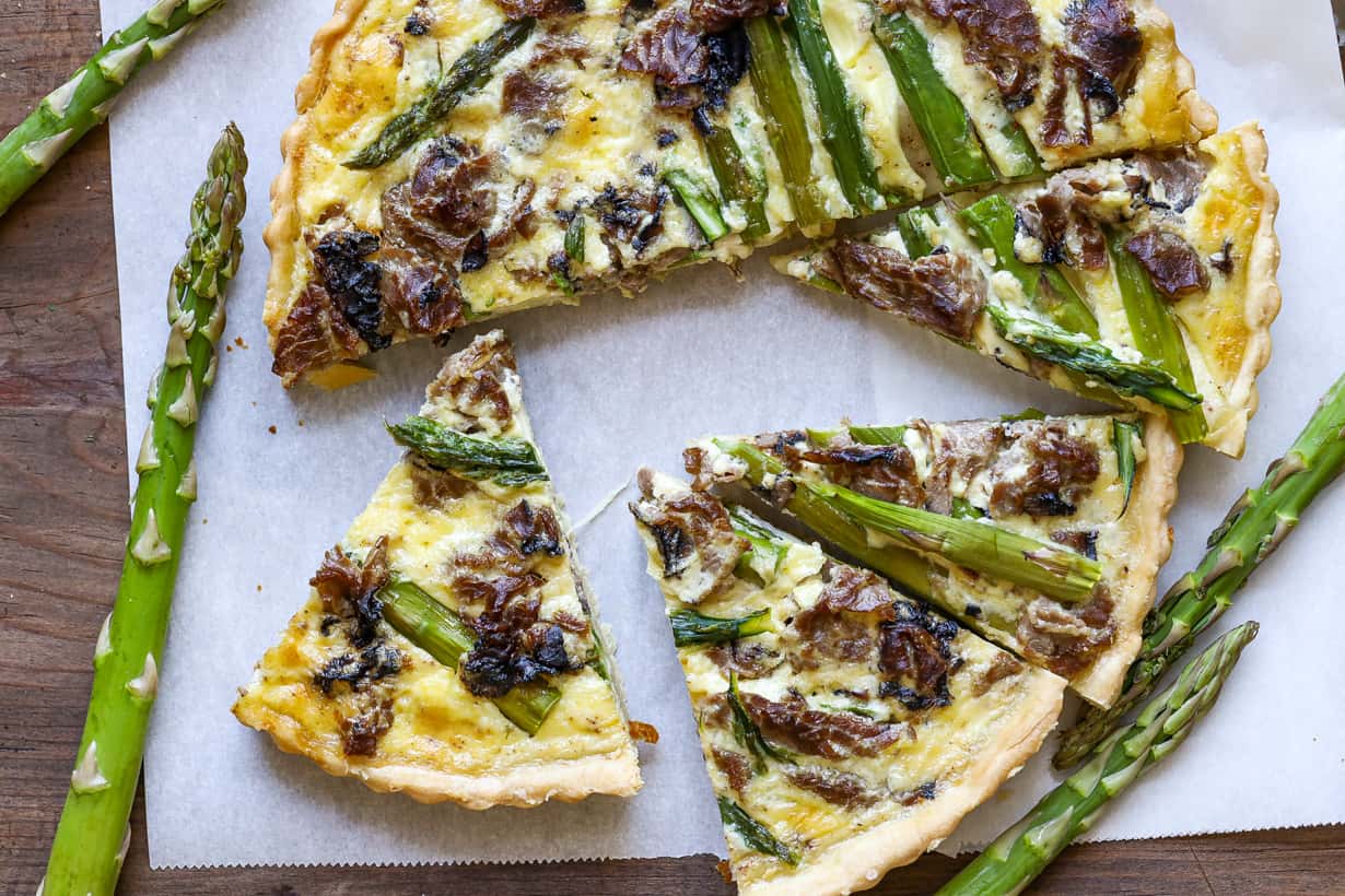 asparagus and tart on parchment paper