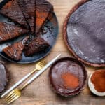 slices of Tarte Aux Chocolat on black plate