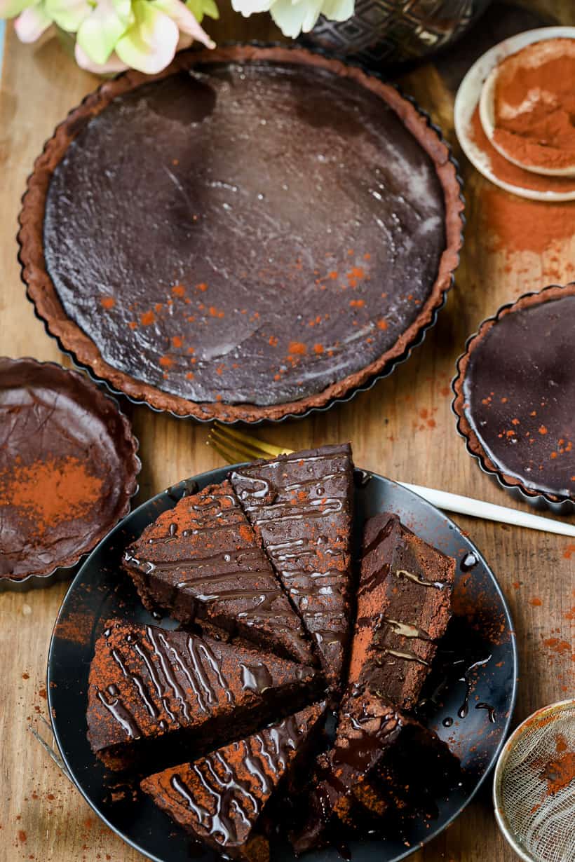 Easy chocolate tart recipe on black plate