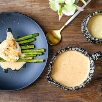hollandaise sauce over eggs