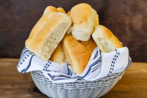 stacked vegan Haitian Bread in basket.