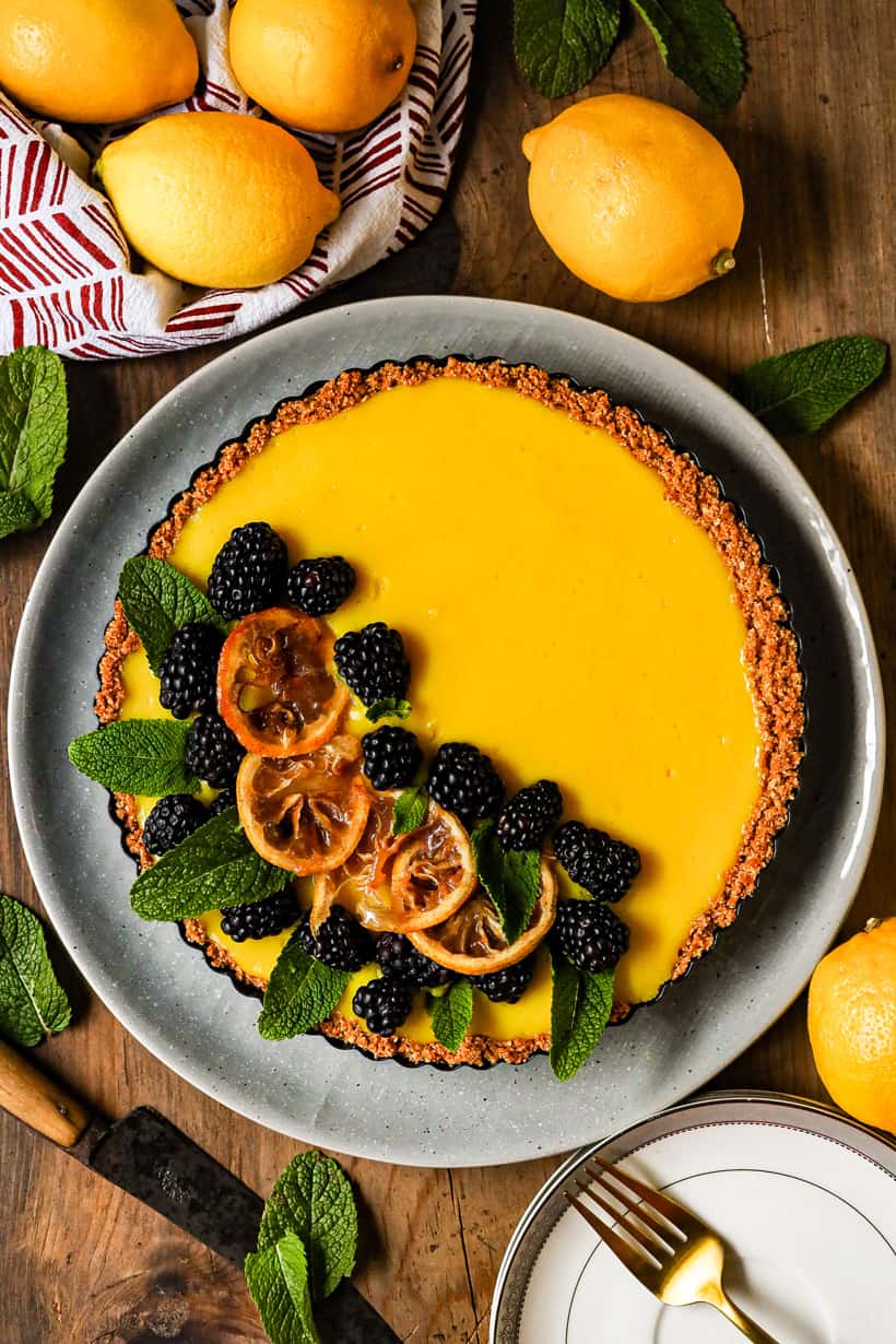 Tart topped with fruits on plate