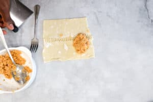 filing puff pastry with meat