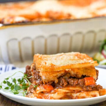 lasagna with herb on plate