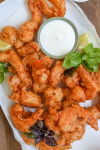 Jumbo Shrimp Tempura with sauce on white plate