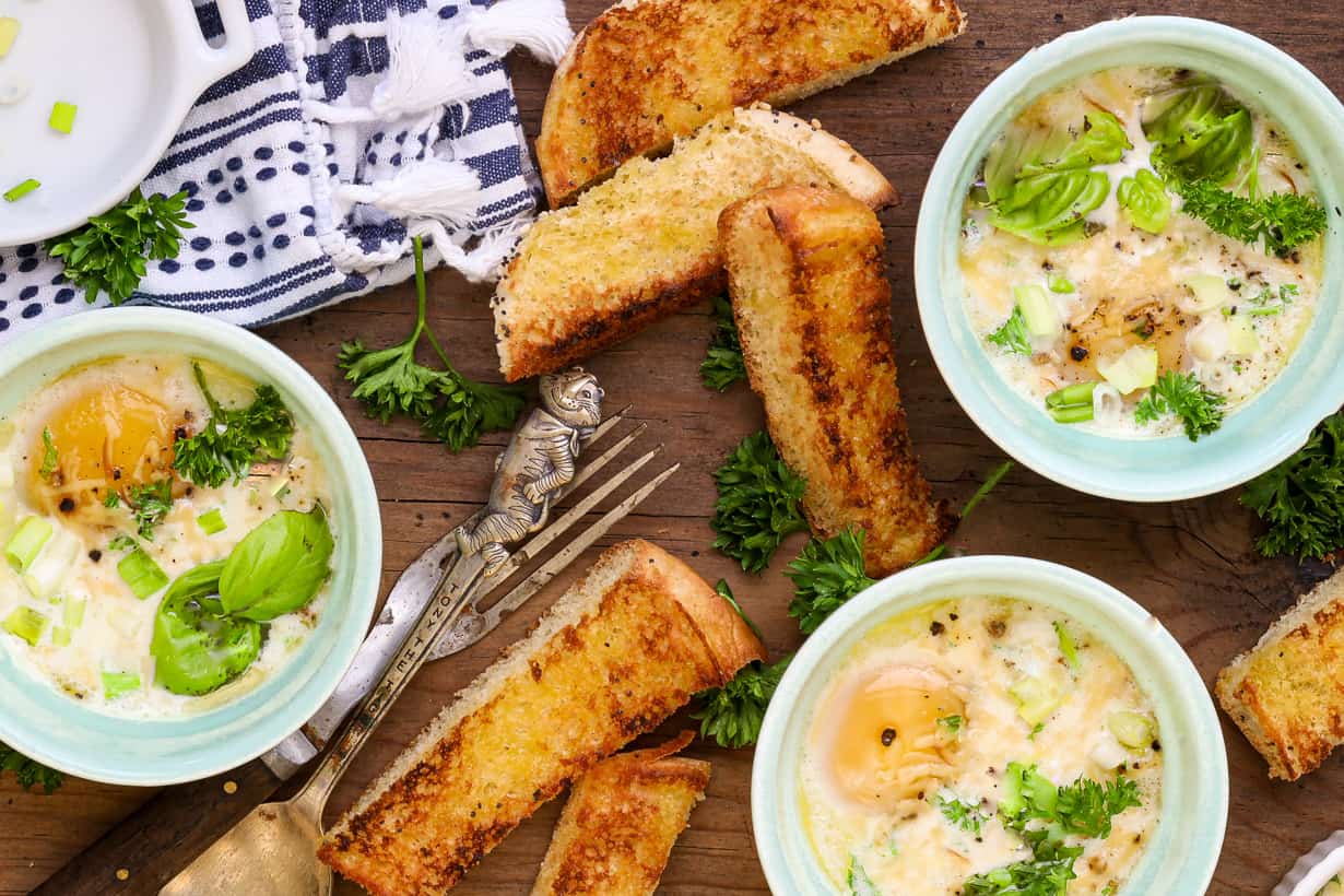 oven baked eggs in ramekins and toasted bread