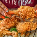 hand holding drumsticks