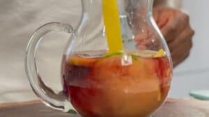 pouring juice in pitcher