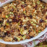 air fryer stuffing casserole in white dish on wooden board