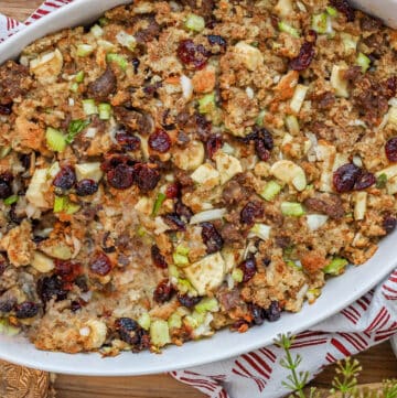 air fryer stuffing casserole in white dish on wooden board