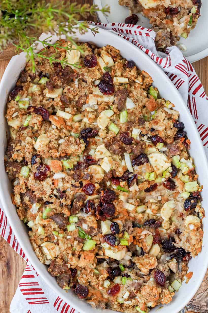 air fryer stuffing casserole in white dish on wooden board