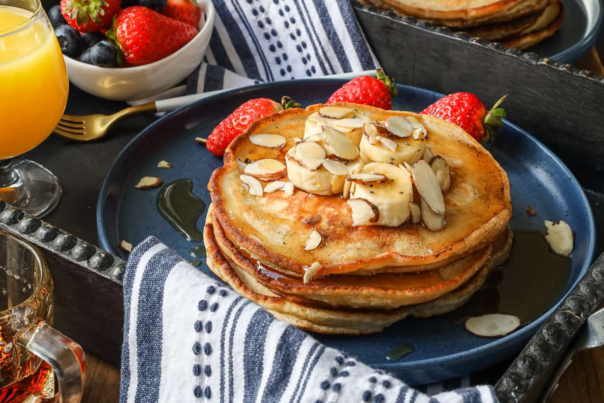 banana pancakes topped with sliced bananas and chia seeds