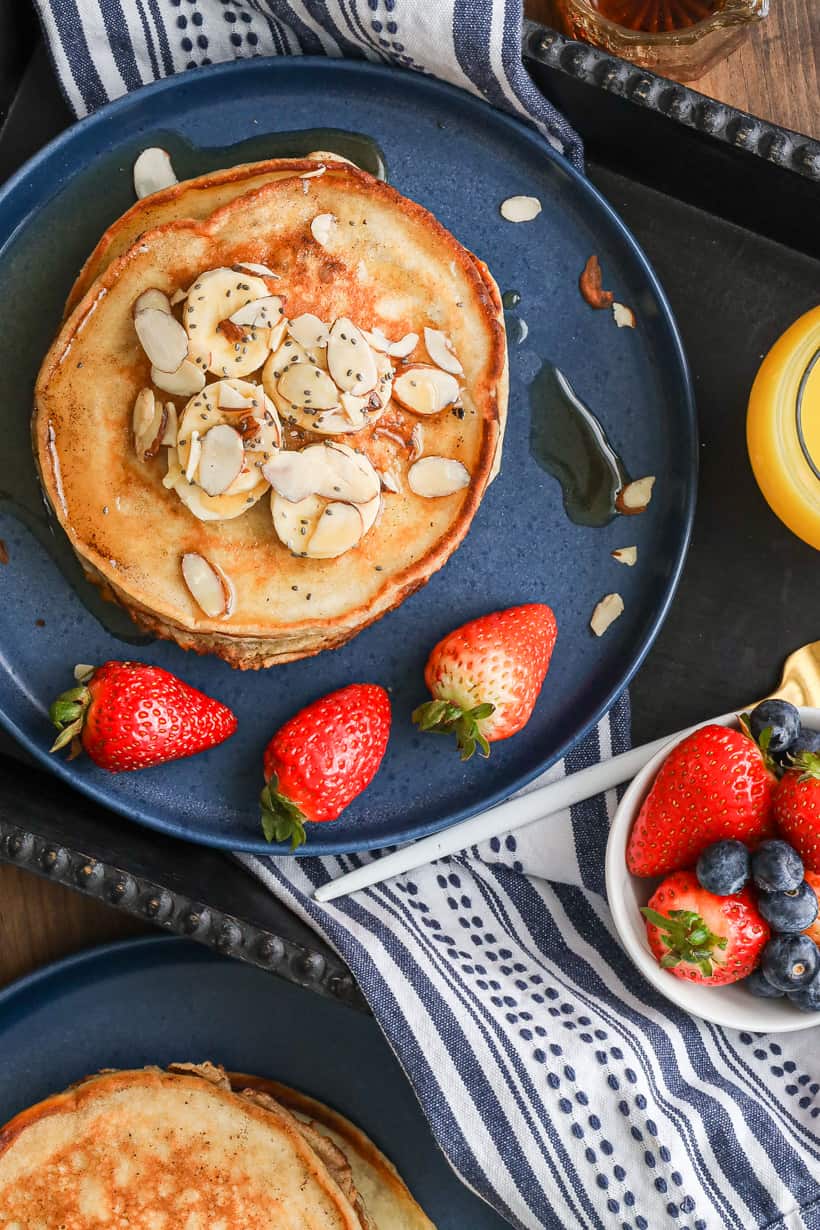 banana pancakes topped with sliced bananas and chia seeds