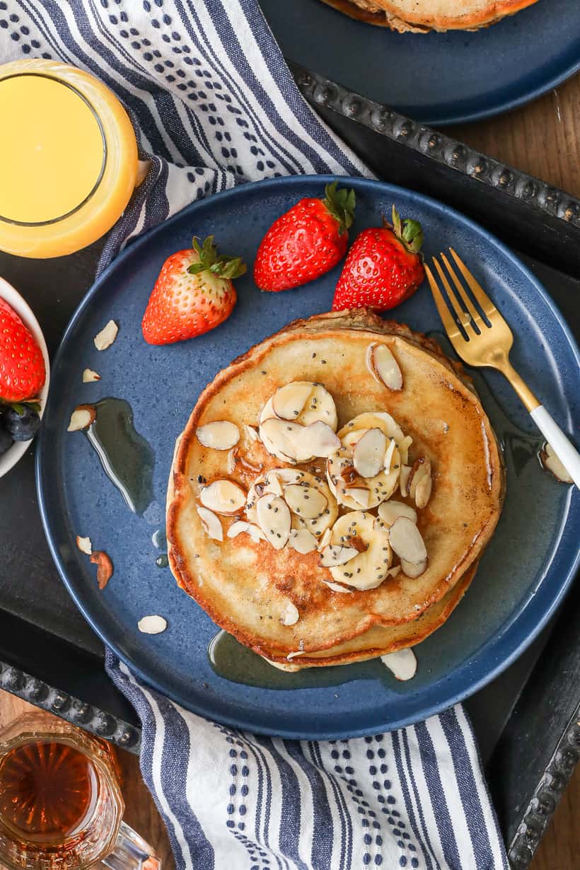 banana pancakes topped with sliced bananas and chia seeds