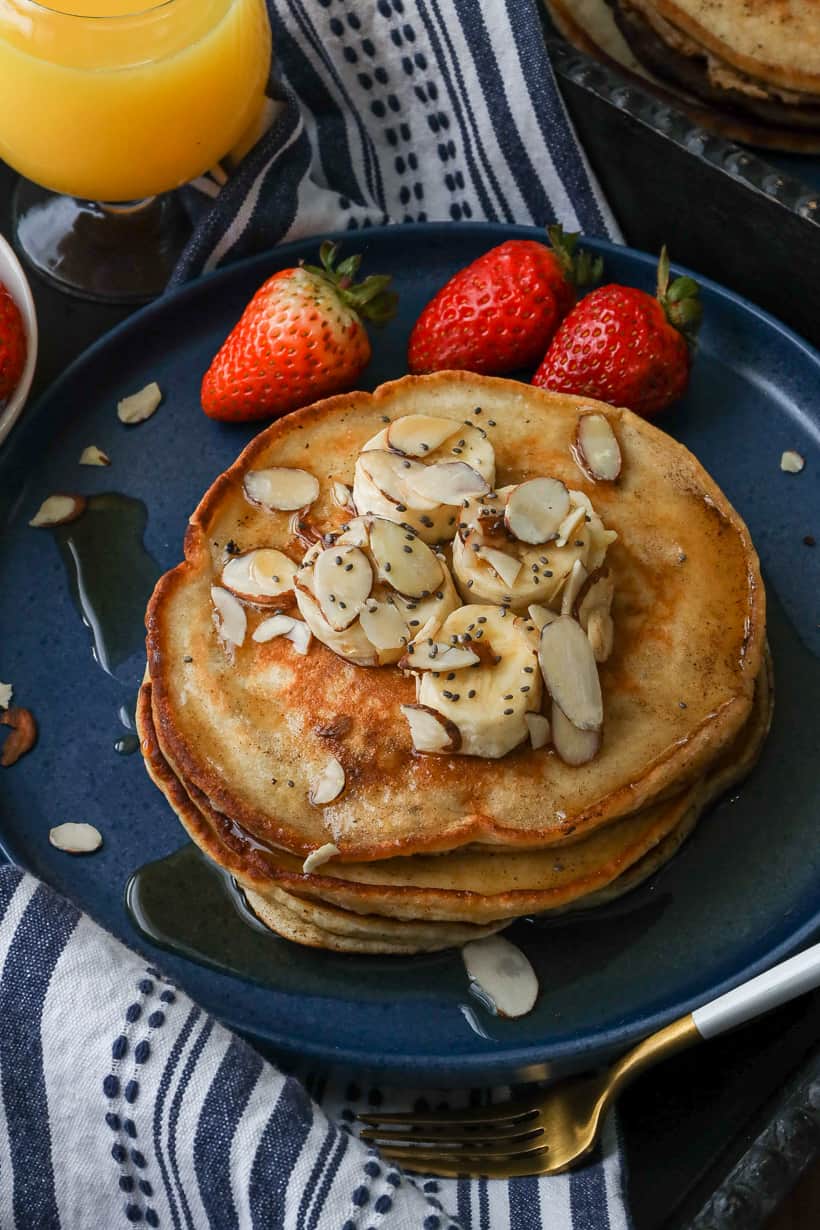 pancakes topped with chia seeds and bananas