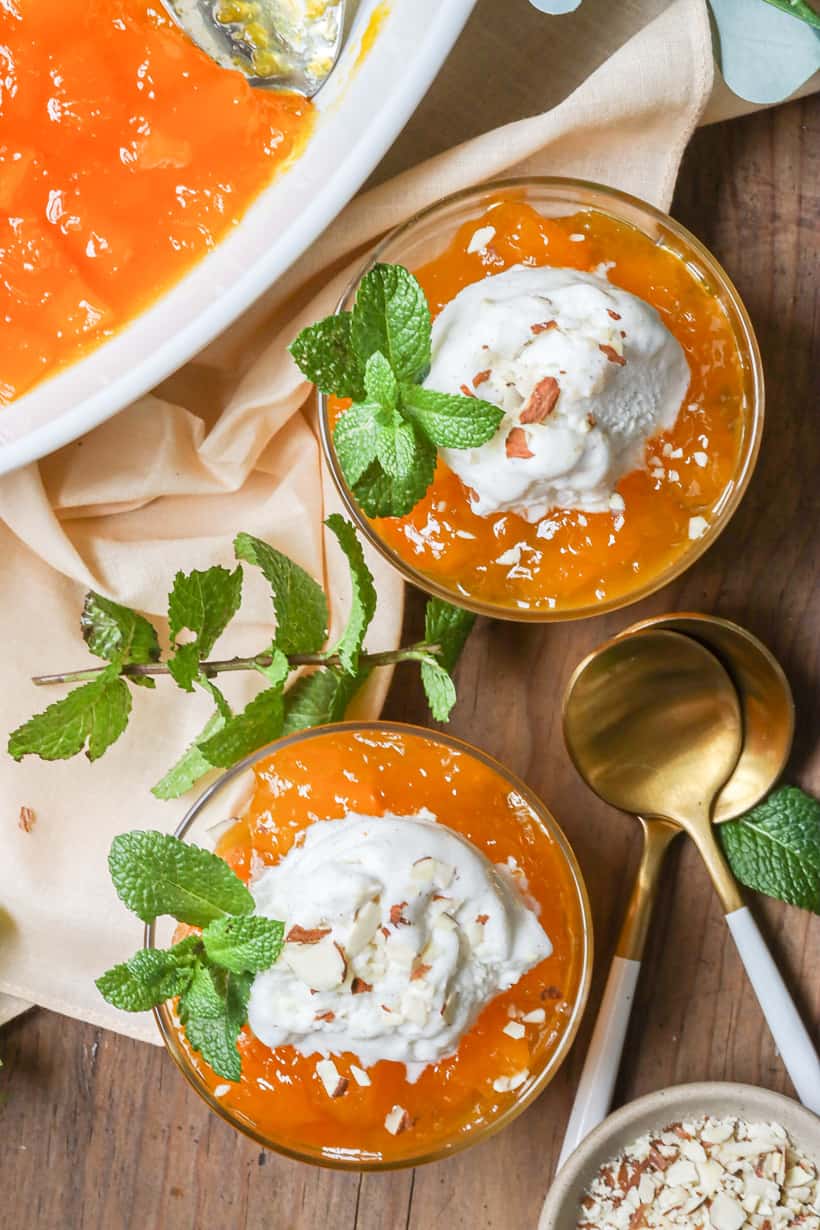 Turkish pumpkin dessert recipe in glasses topped with ice cream and nuts