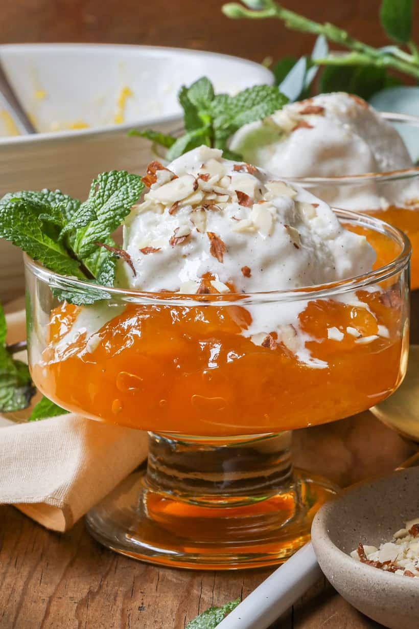 Turkish pumpkin dessert recipe in glasses topped with ice cream and nuts