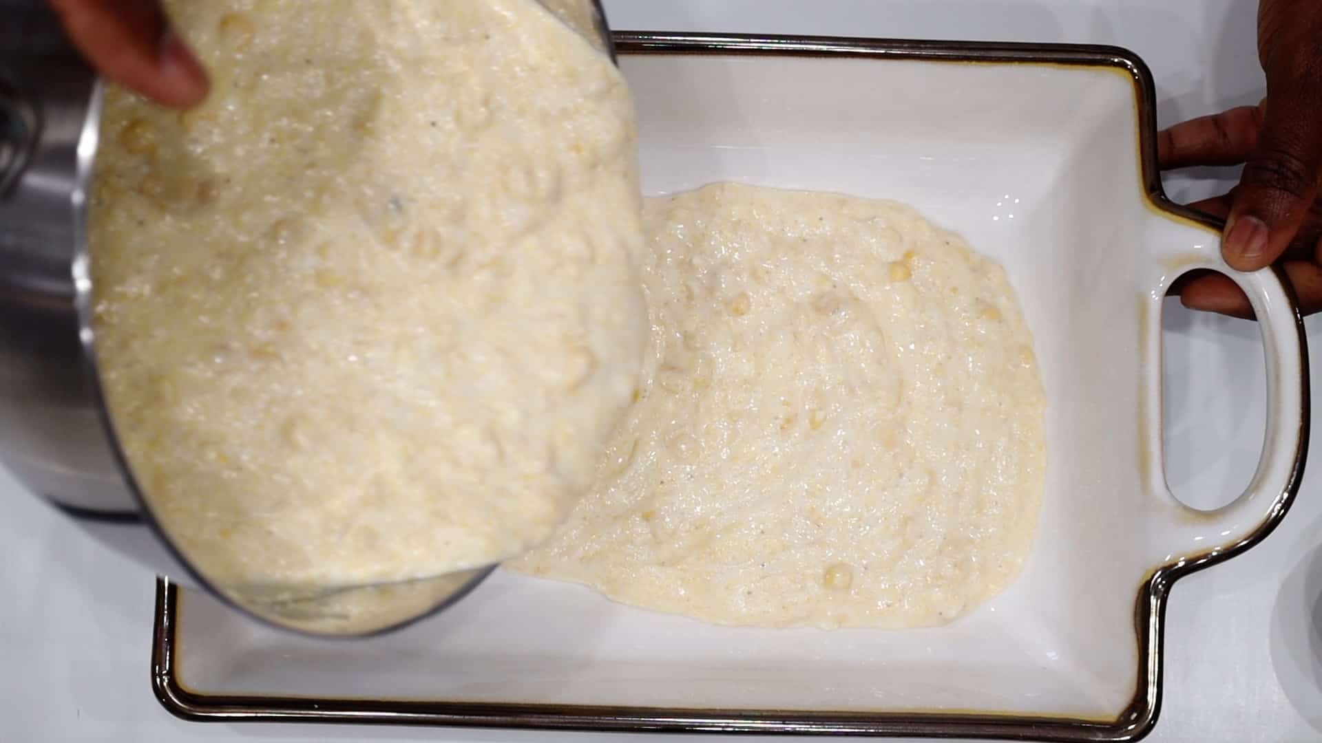 Adding corn mixture to casserole