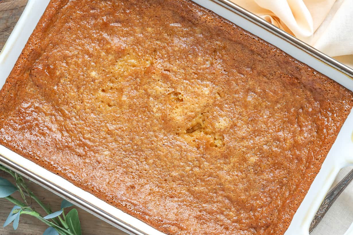 Corn pudding casserole on wooden board