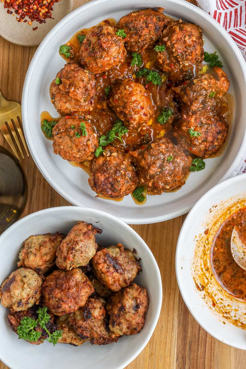 Haitian Meatballs in sauce topped with fresh parsley