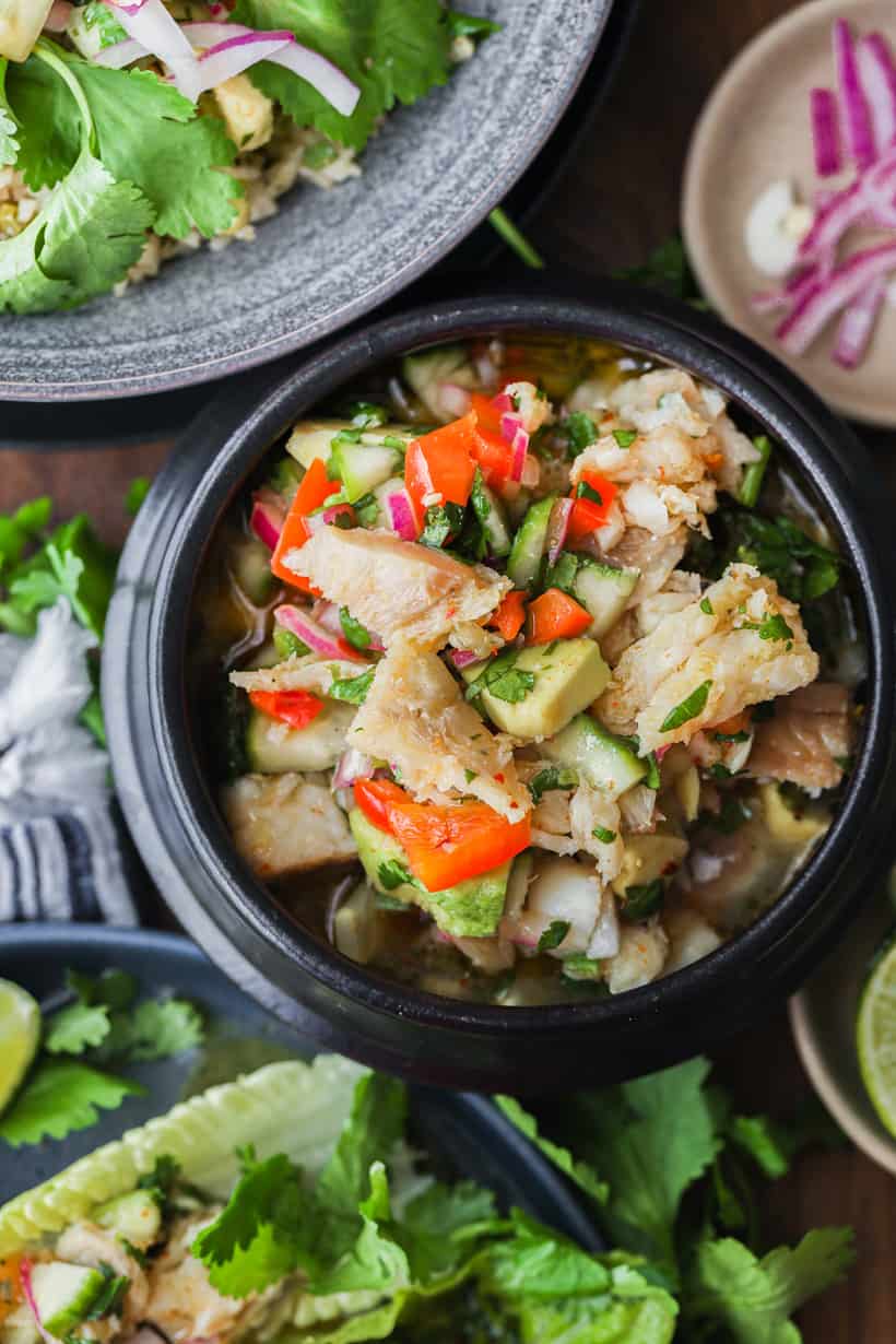 Cod fish ceviche in black bowl
