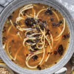 green lentils soup in gray bowl