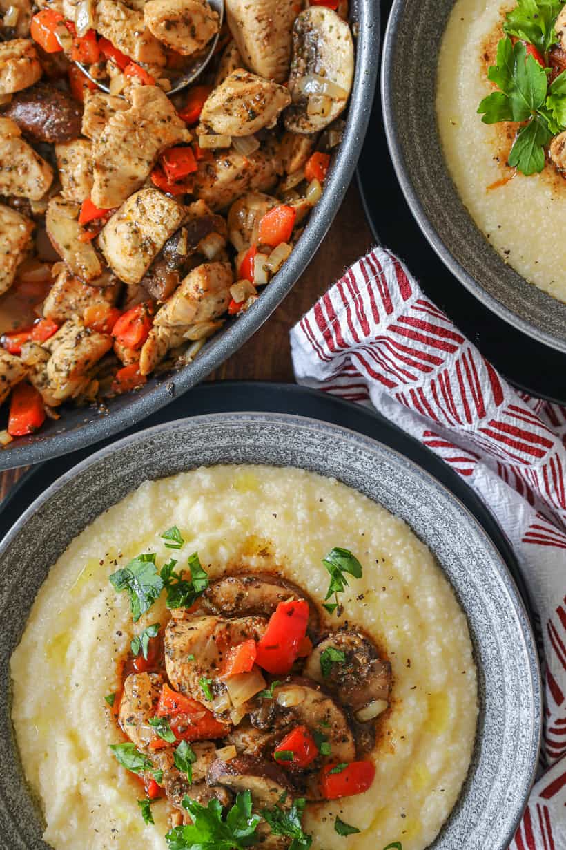 mushroom chicken over a bed of grits