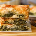 3 spinach pie stacked on top of each other